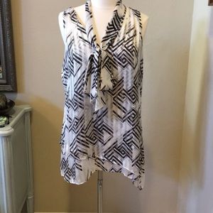 Layered tunic with an asymmetrical hem